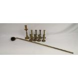 Four pairs of brass candlesticks