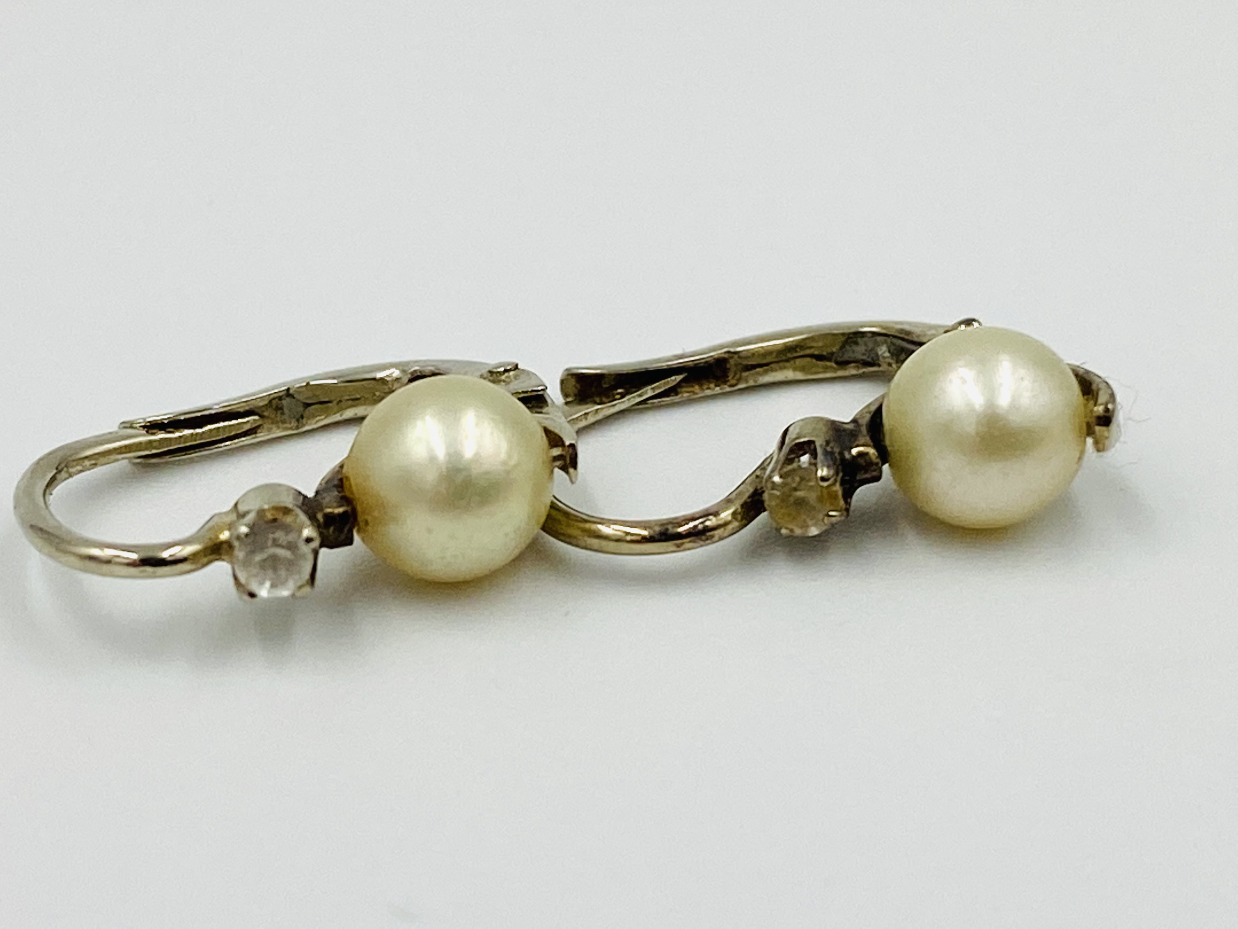 Pair of 9ct gold and pearl earrings; together a pair of white metal and pearl earrings. - Image 3 of 4