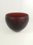 Red glass bowl, signed by artist