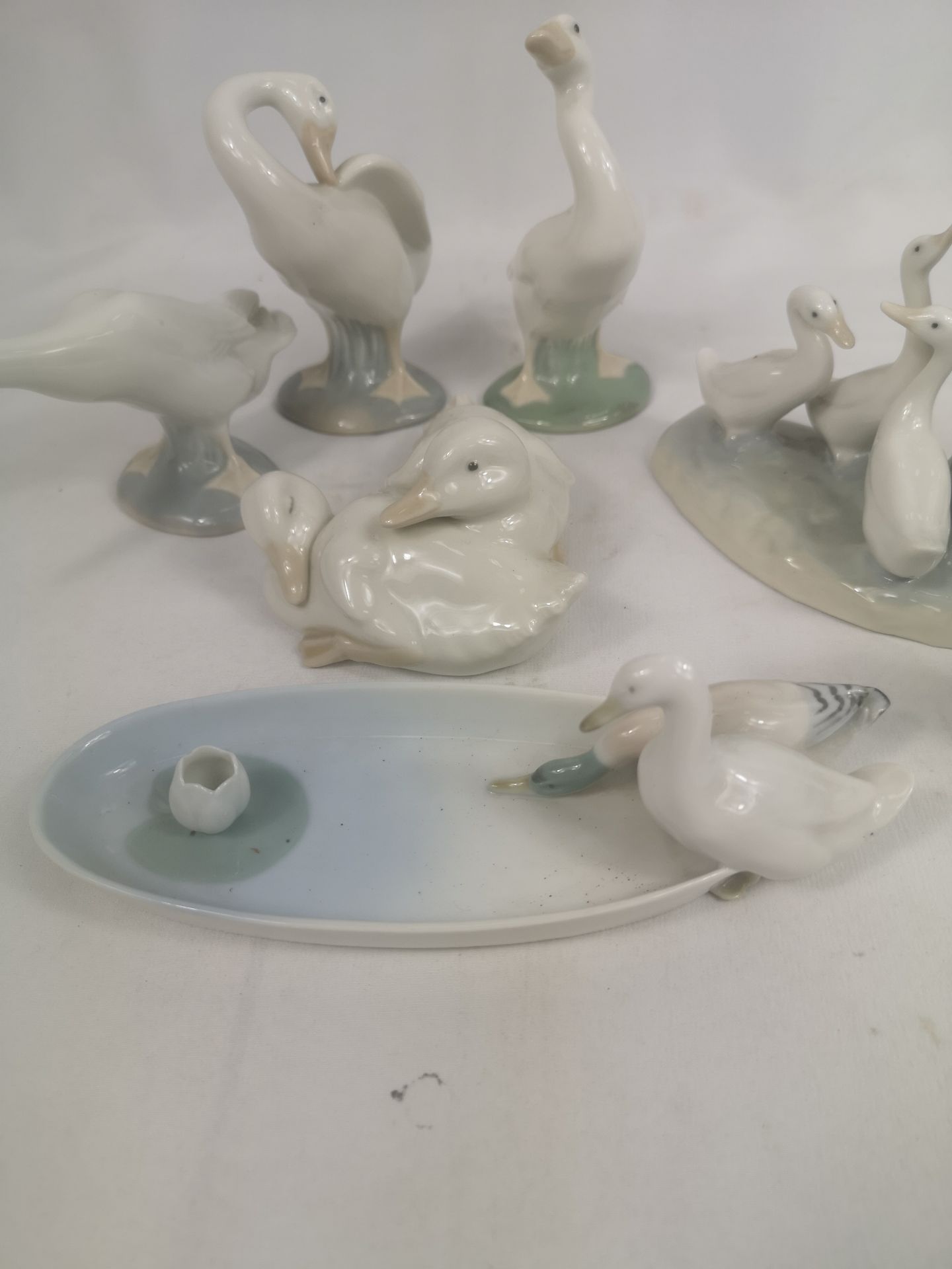 Three Lladro figures, two Nao figures and a trinket dish - Image 5 of 5