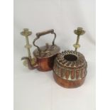 Victorian copper coal scuttle, copper jelly mould and pair of brass candlesticks