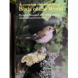 Twelve copies of A Complete Checklist of the Birds of the World by Richard Howard