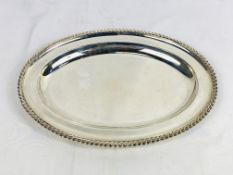 Silver dish with gadrooned edge