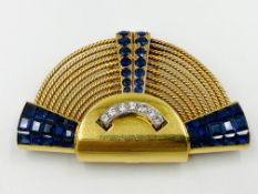 Franch gold clip set with sapphires and diamonds