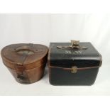 Woodrow top hat in leather box together with a canvas hat box