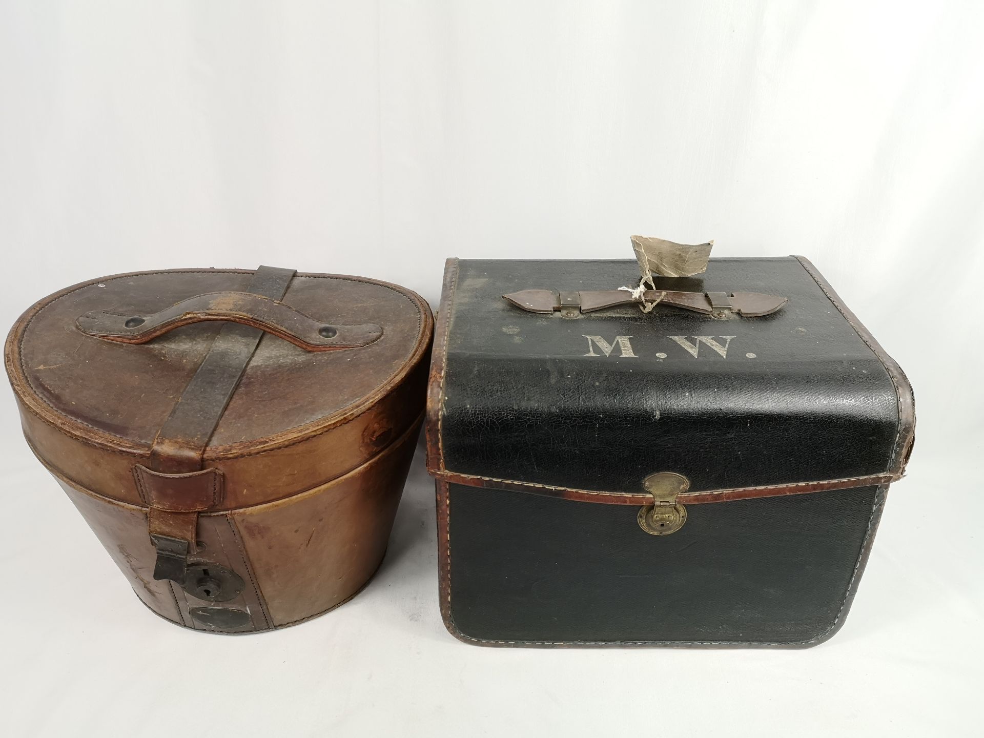 Woodrow top hat in leather box together with a canvas hat box