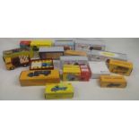 Fourteen boxed Dinky diecast model trucks and lorries.