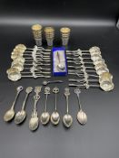 Eighteen white metal spoons, together with a quantity of silver plate items