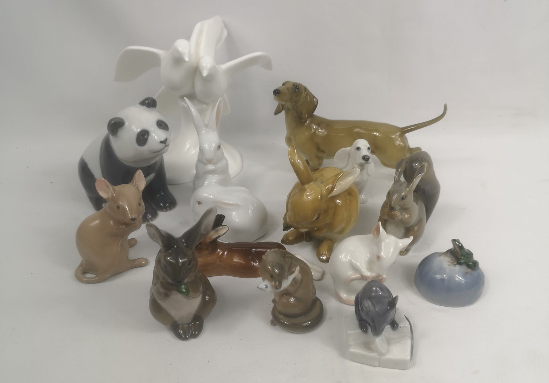 Eight Royal Copenhagen animal figurines together with seven others