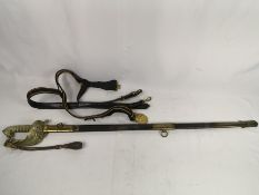 Early 20th century naval officers sword with leather and brass scabbard