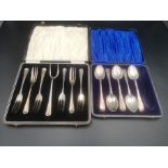 Five silver tea spoons together with a boxed set of silver forks