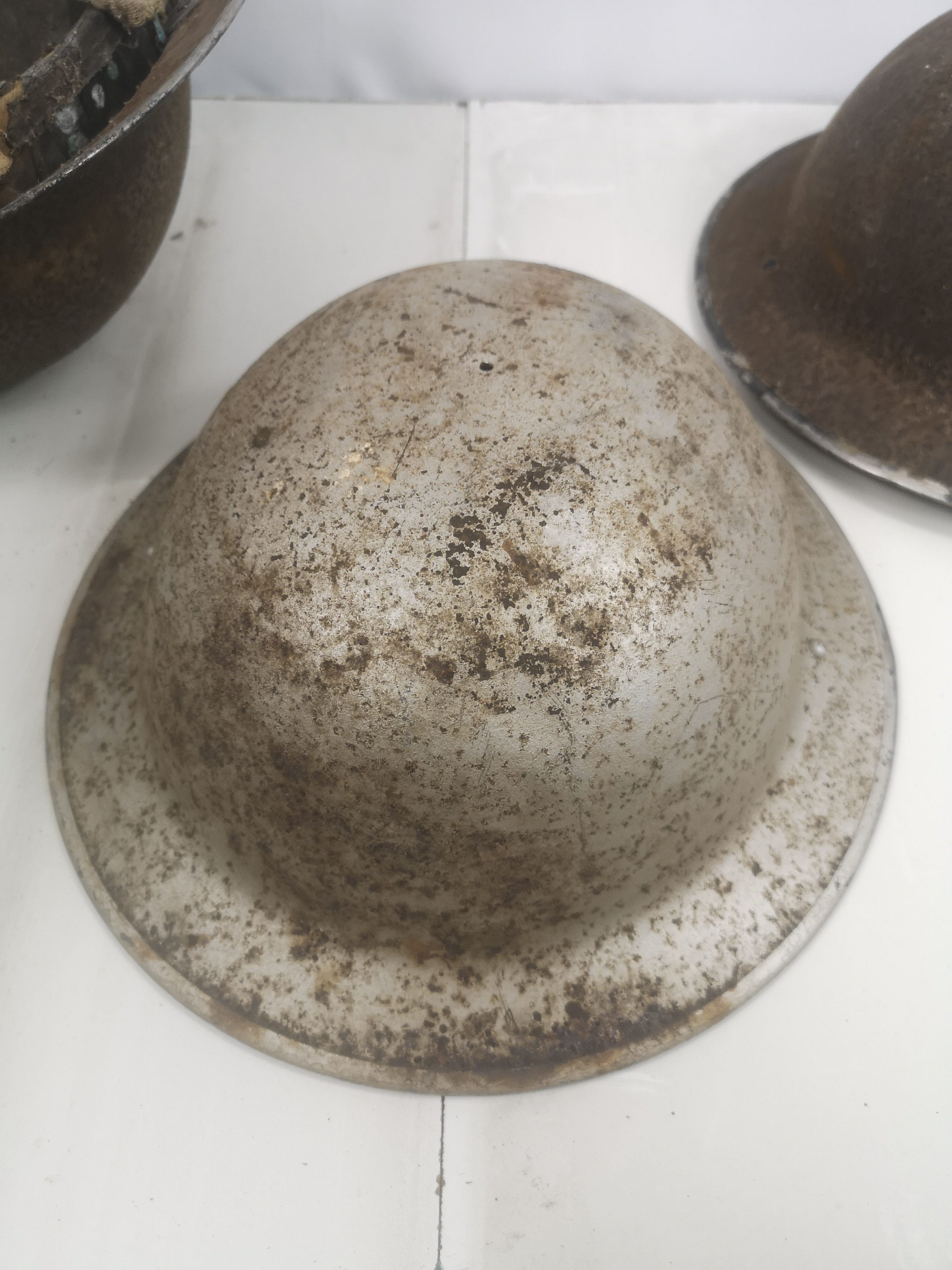 Three WWII steel military helmets. - Image 4 of 7