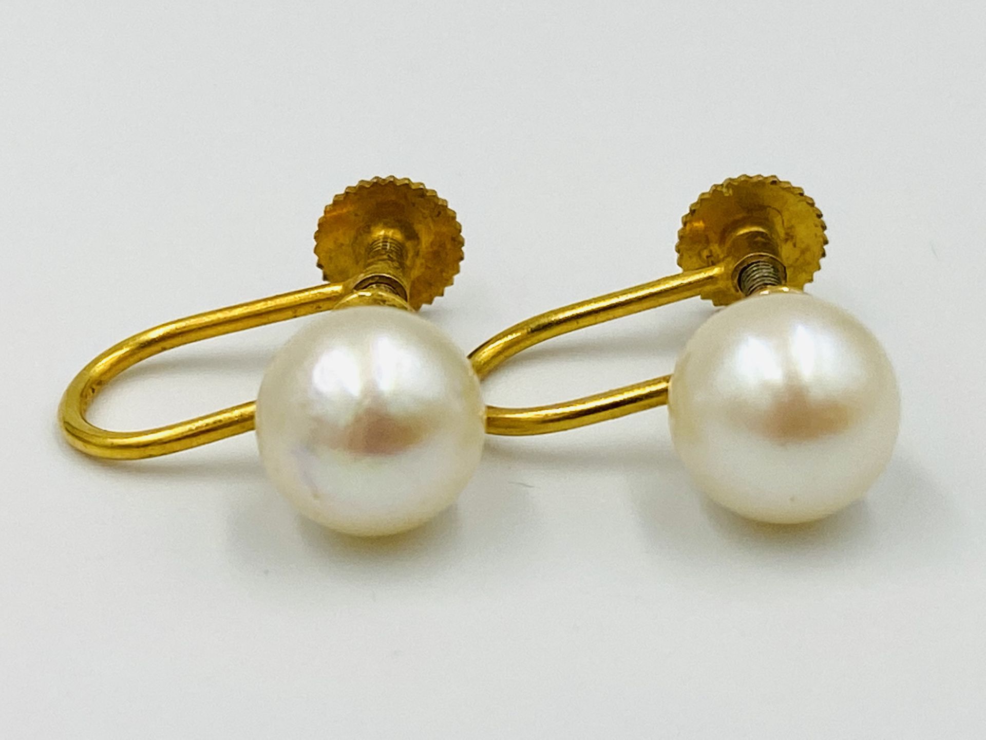 Pair of 9ct gold and pearl earrings; together a pair of white metal and pearl earrings. - Image 2 of 4