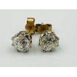 Pair of 9ct gold and diamond earrings