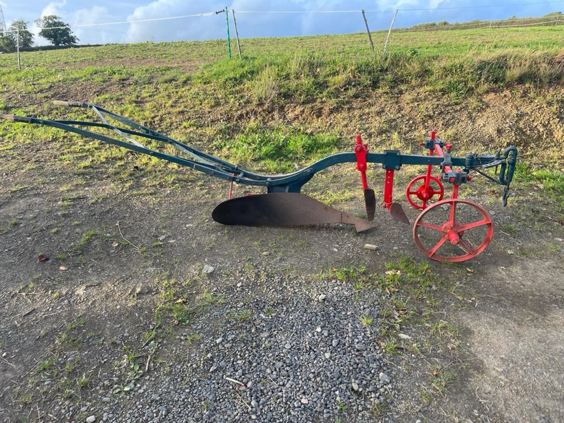 RNDH4 HORSE DRAWN MATCH PLOUGH built by Ransomes of Ipswich. Painted blue and red, in good