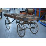 COFFIN BIER built by Drye of Marlow, 1901. In varnished wood on wire wheels, complete with leather
