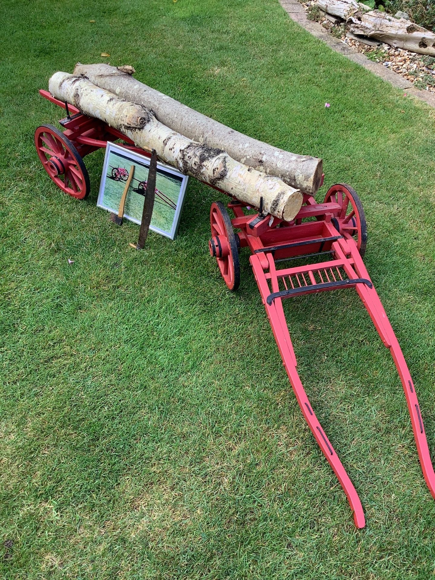 TIMBER BOB painted red on iron shod wheels. Comes with tools. 6ft long and complete with shafts.
