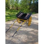 SQUARE-SIDED GOVERNESS CART to suit a 12 to 13hh. Painted black on a yellow undercarriage with 12