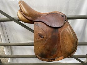 Brown 17" saddle by Optimus. This lot carries VAT.