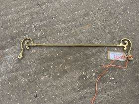 Brass rein rail. This lot carries VAT.