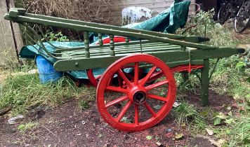 COSTERMONGER'S HAND CART the slatted body with sloping sides painted green, on red wheels