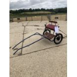 TWO WHEEL EXERCISE CART to suit a pony, the metal frame painted black with varnished wood slatted