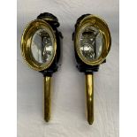 Pair of oval fronted lamps and rear lamp with bracket, by Lawton.