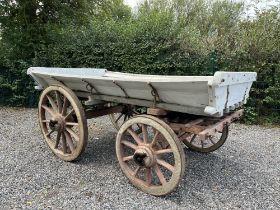 HARVEST WAGON in original condition, although the floor is in need of replacing; with rear rade
