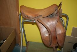 Rare saddle by Champion & Wilton, designed for a rider with a prosthetic right limb