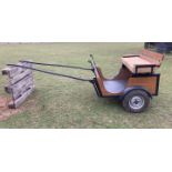 TWO WHEEL EXERCISE CART to suit 13hh. In varnished wood with black painted frame on car type