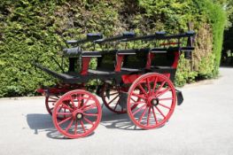 CHARABANC built by Deason of Windermere. Varnished panels with black painted frame, on red