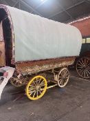 BOW TOP WAGON the dray axles understood to be dated 1904. The exterior has a varnished gold coloured