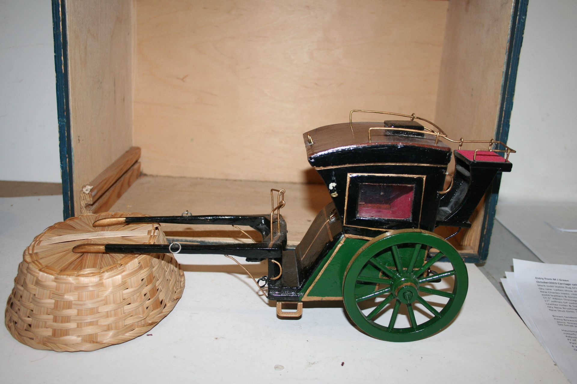 Model of a Hansom Cab, complete with carrying case. 14" long including shafts by 7 1/2" high.