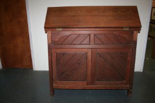 Large pine saddle horse with folding table top, cupboard and drawer