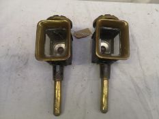 Pair of black and brass lamps. This lot carries VAT