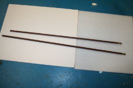 Two leather covered side saddle canes