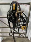 Black and yellow stallion roller & bridle. This lot carries VAT