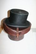 Top hat and leather hat box