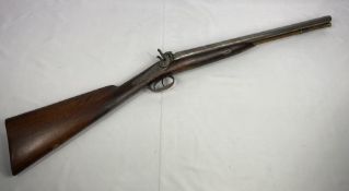 19th century muzzle loading side by side shotgun