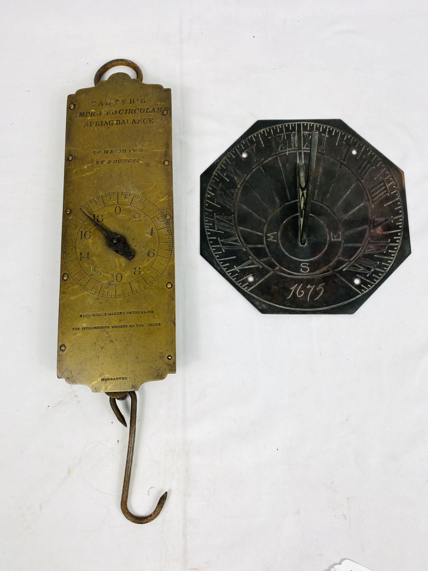 Salter's spring balance together with a brass sundial