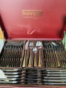 Two sets of Solingen twelve place cutlery.