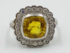 18ct white gold, yellow sapphire and diamond ring