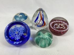 Five Caithness paperweights