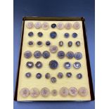 Collection of 44 carved horn buttons