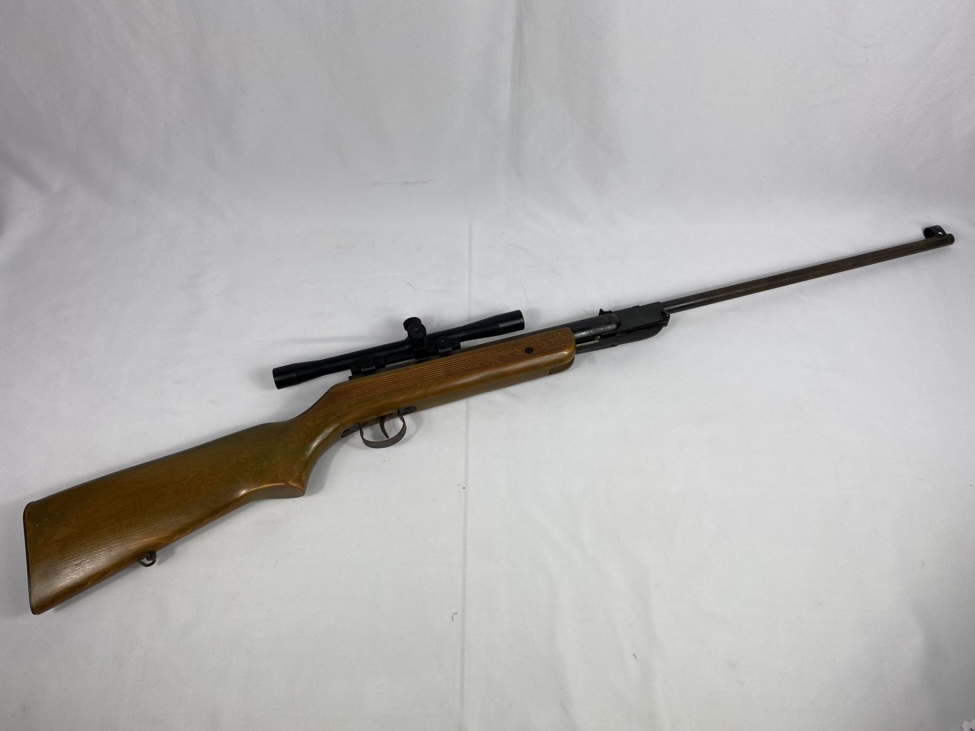 Air rifle with telescopic sight