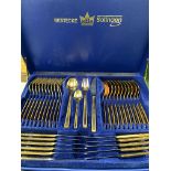 Twelve place canteen of gold plated cutlery.