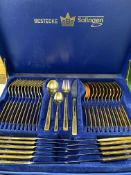 Twelve place canteen of gold plated cutlery.