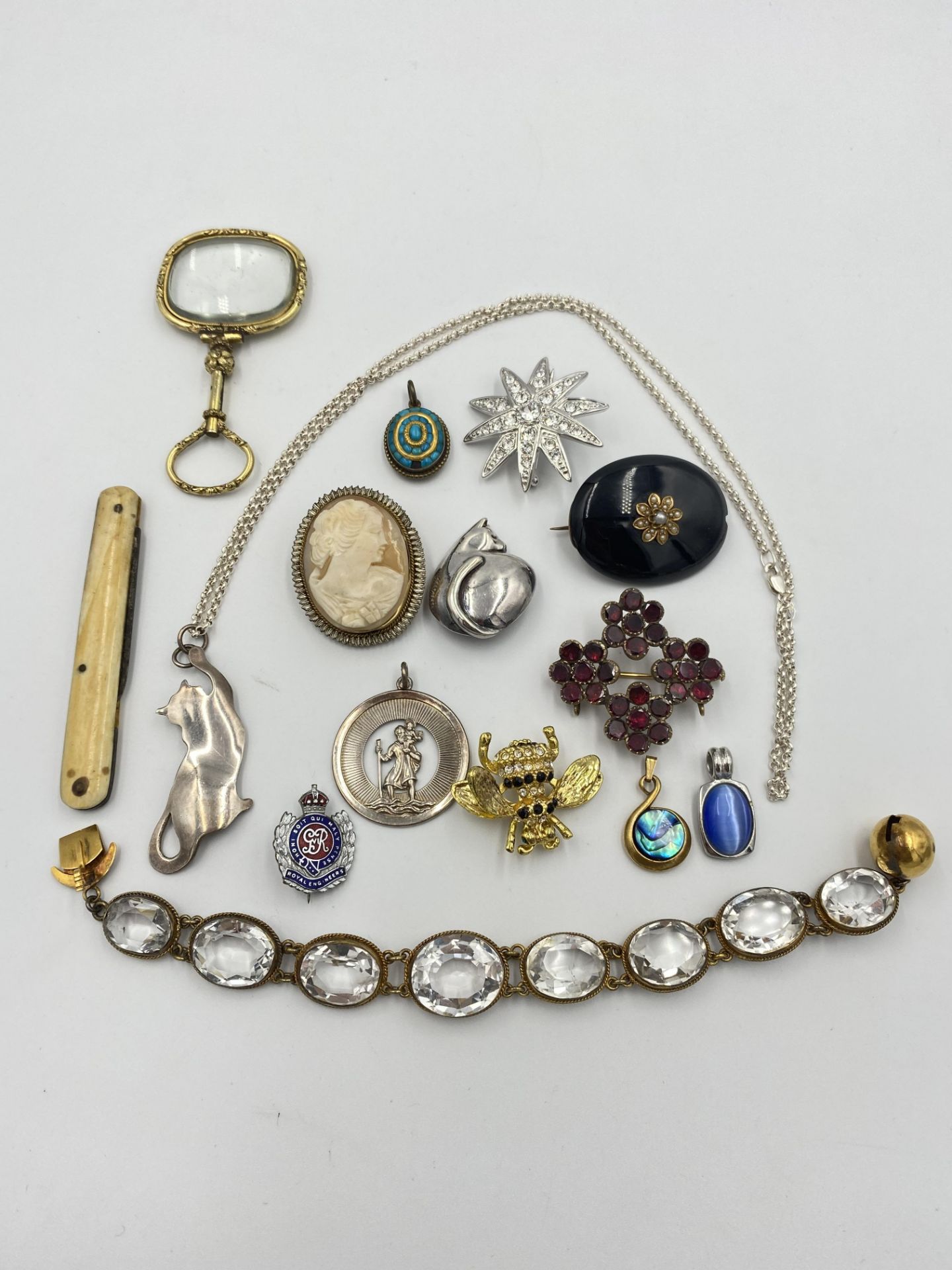 A cameo brooch, a gilt metal bracelet and a quantity of costume jewellery