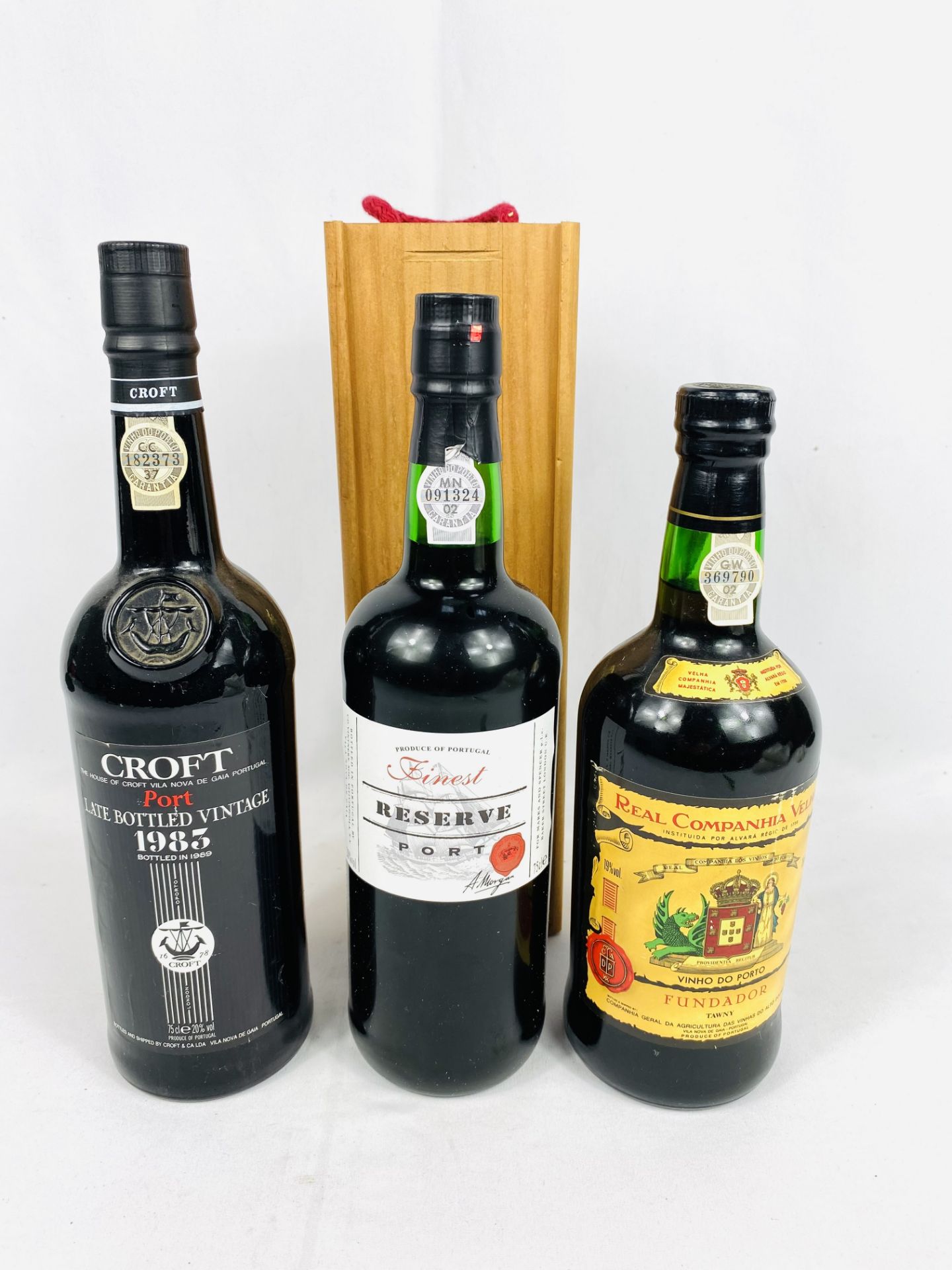 Bottle of Finest Reserve port and two other bottles of port