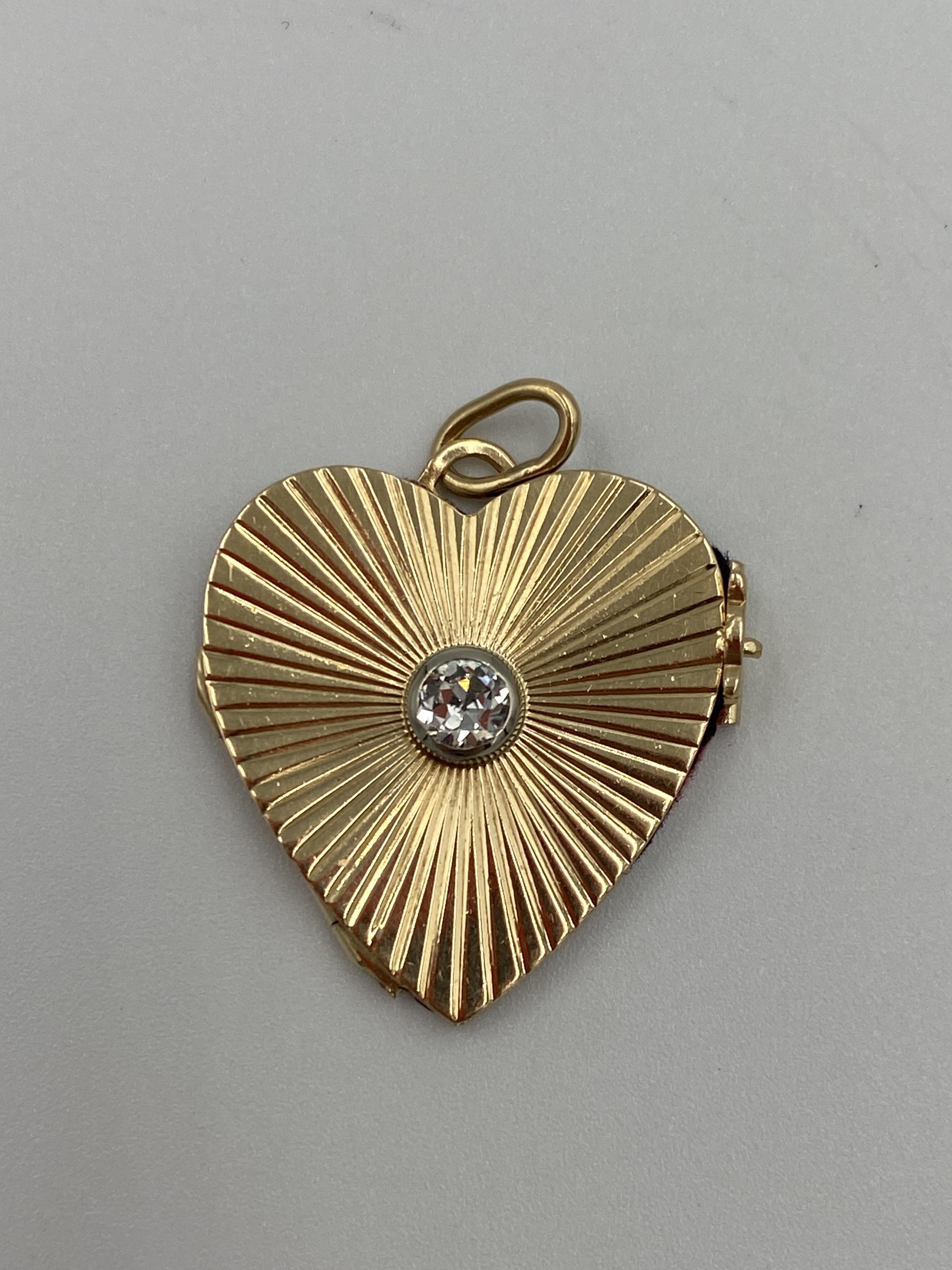 14ct gold and diamond locket